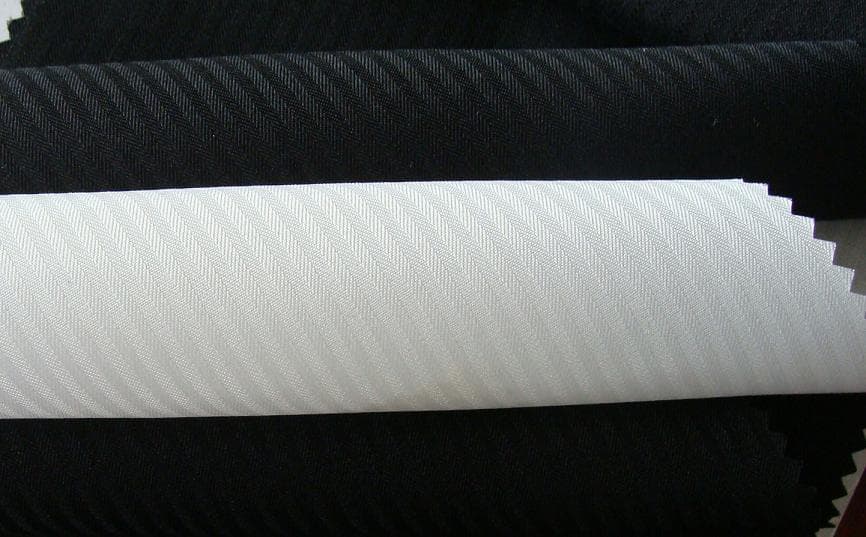 White and black herringbone pocketing fabric